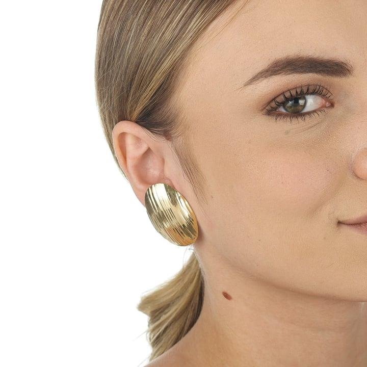 BRINCO OVAL 4,0 CM COM DETALHES