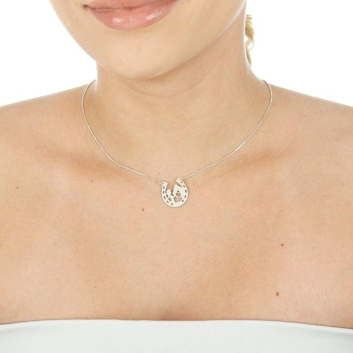 FERRADURA COM CAVALO C/ CORRENTE V12